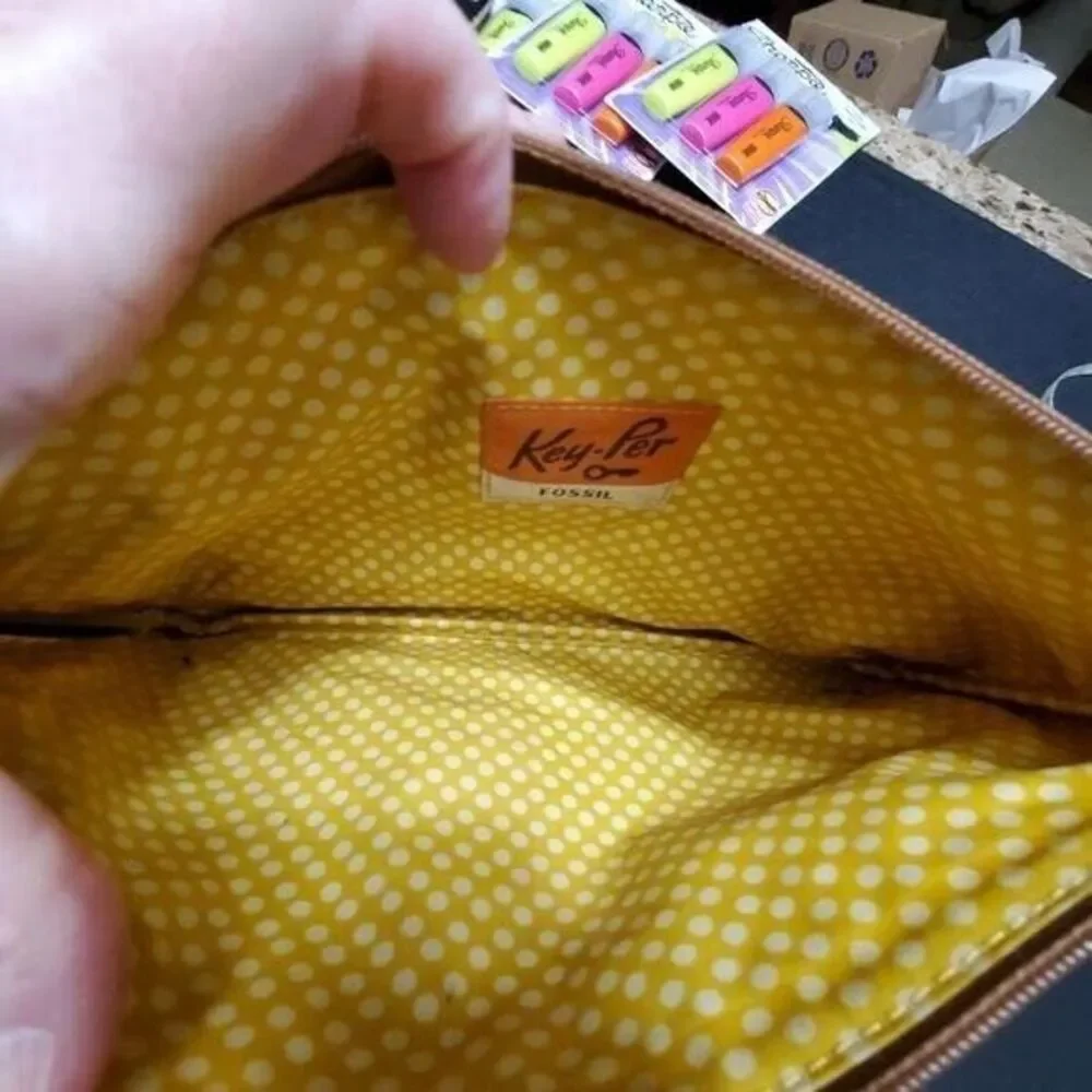 Fossil blue and brown makeup bag